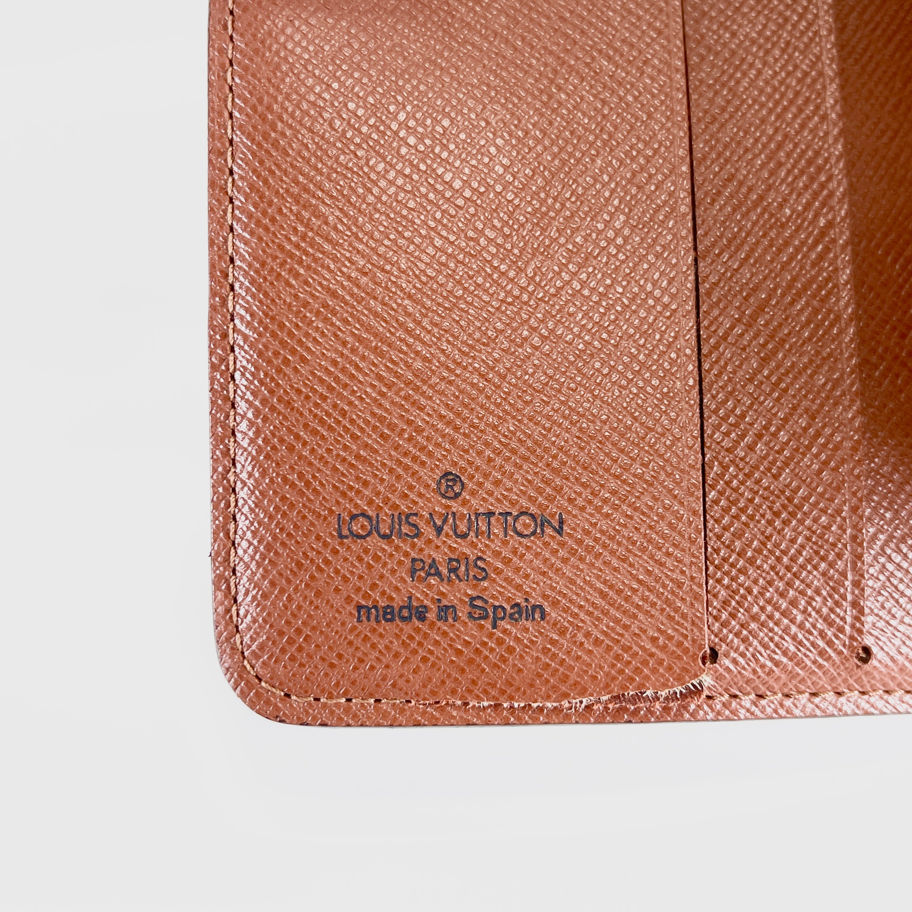 2604 secondhand LV Monogram compact Zip