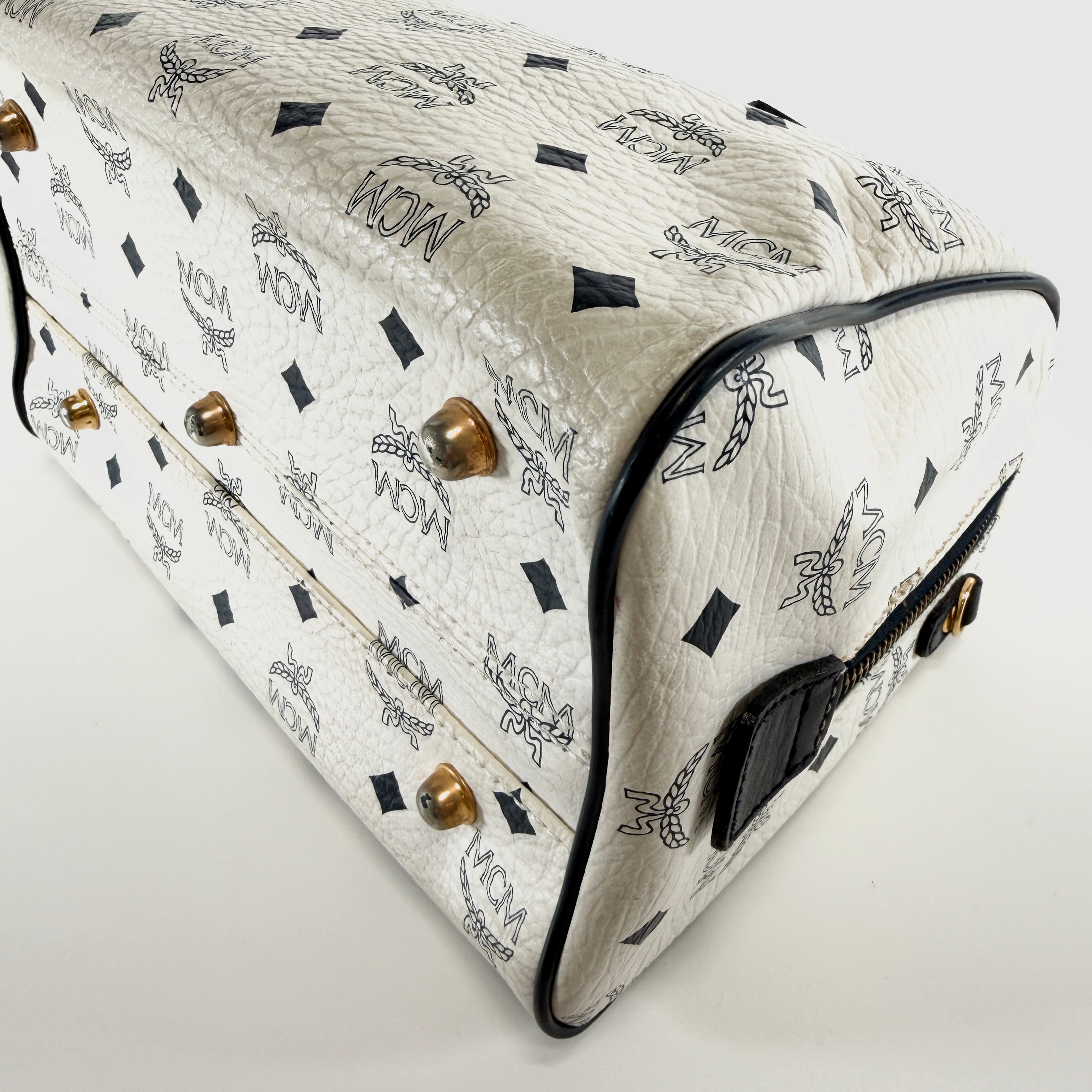 2605 secondhand MCM hand bag + ×