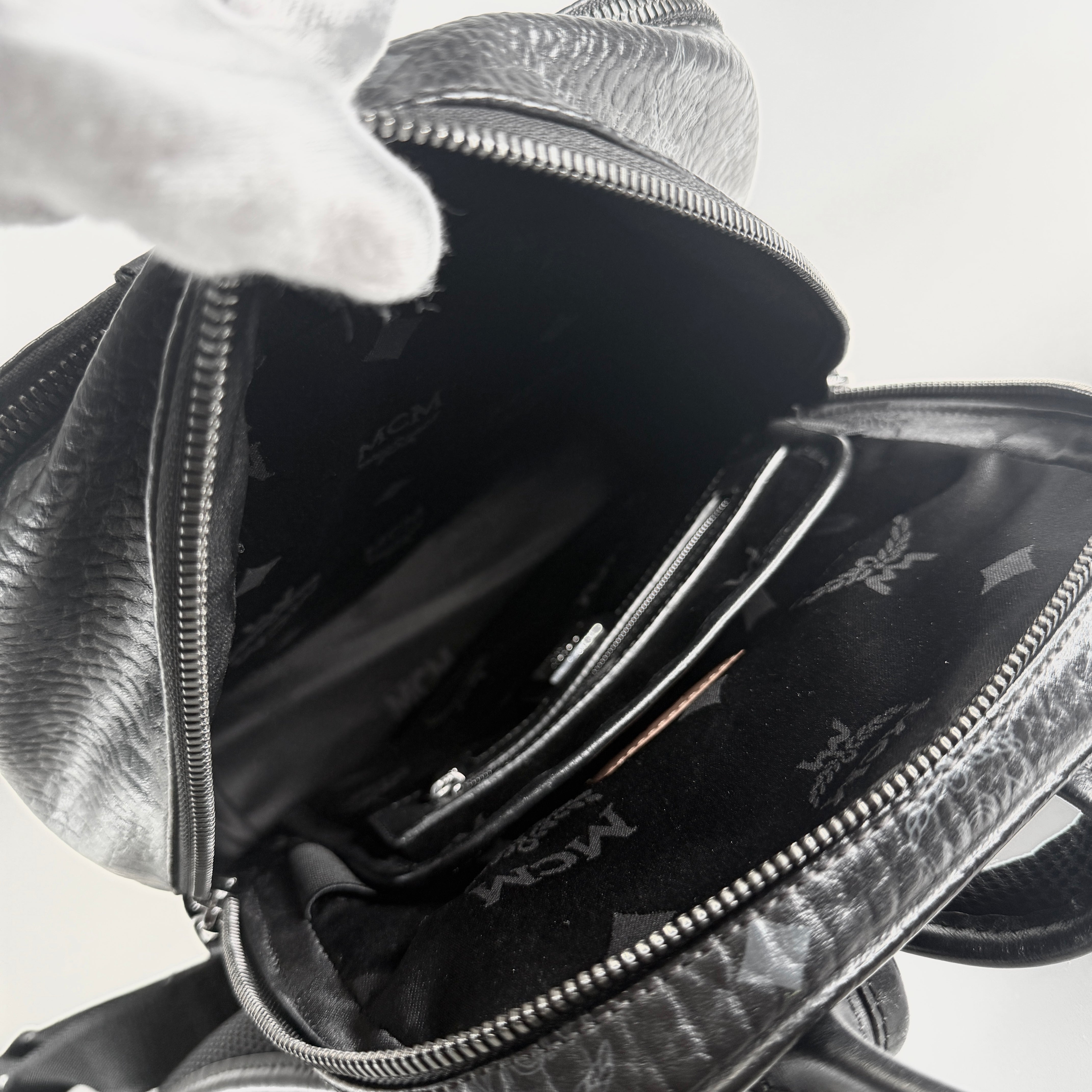 2607 secondhand MCM backpack black