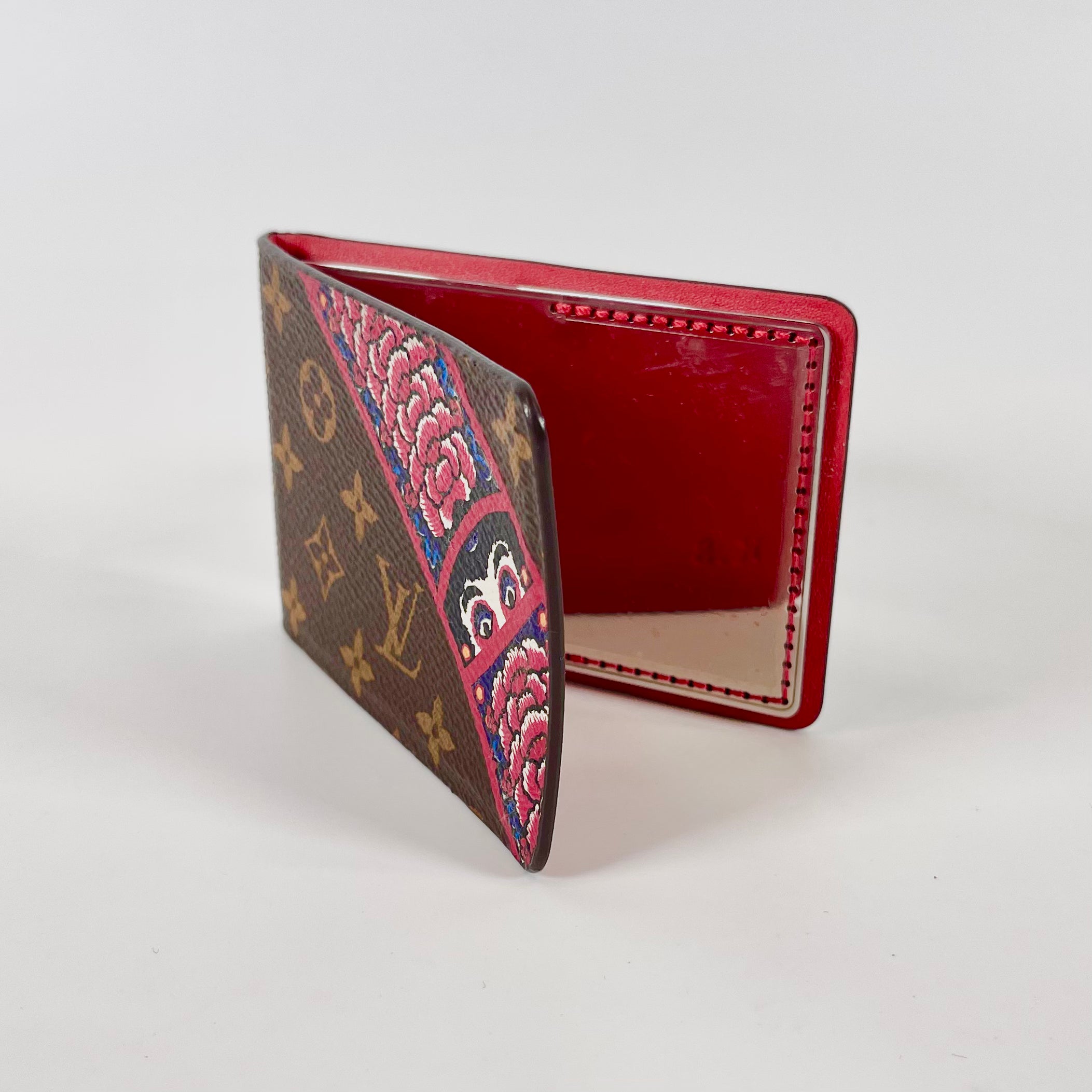 2511 Louis Vuitton Miroir Nomad Orelian