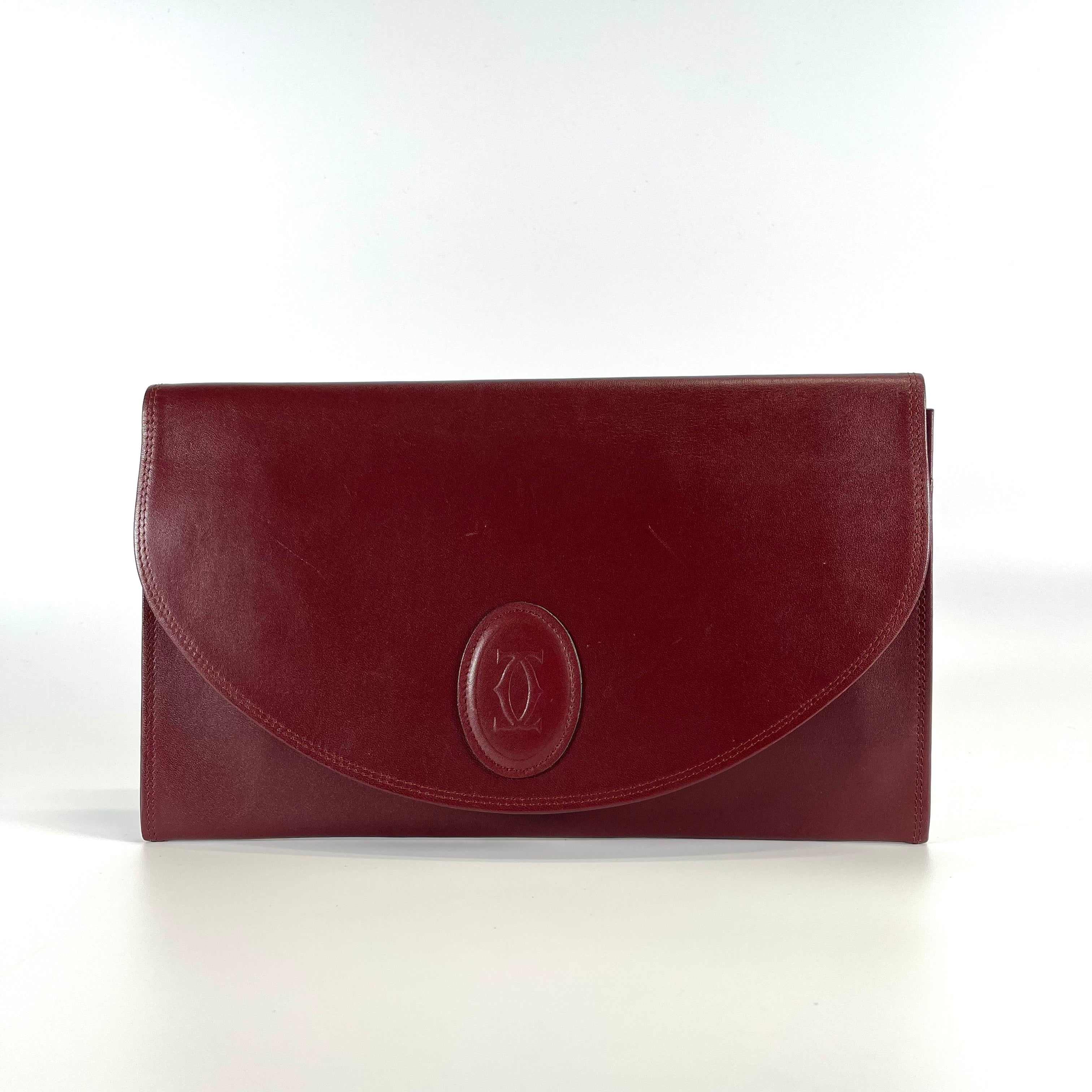 2601 CARTIER must leather clutch Bordeaux