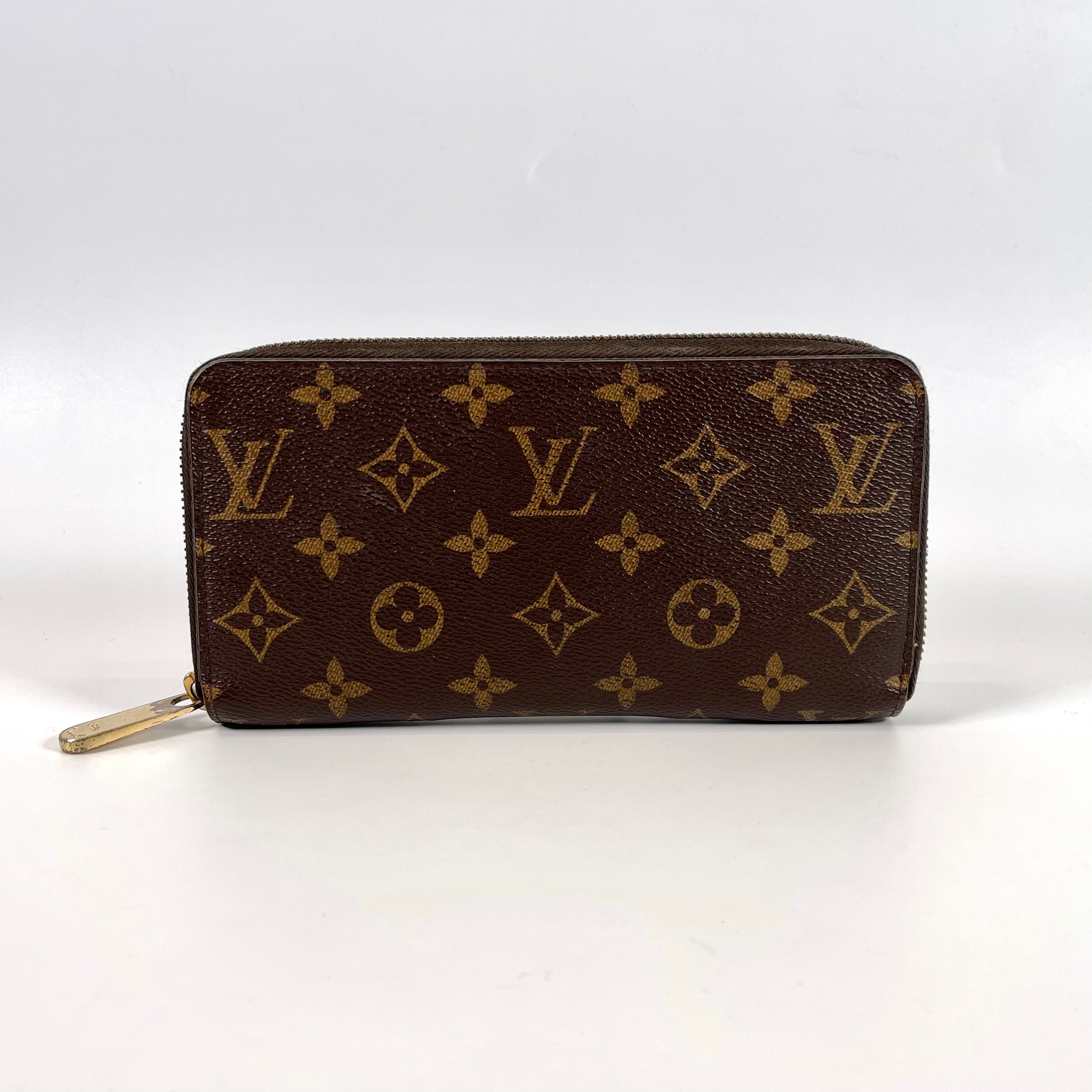 2512 secondhand Louis Vuitton Monogram Zippy Wallet Fuchsia