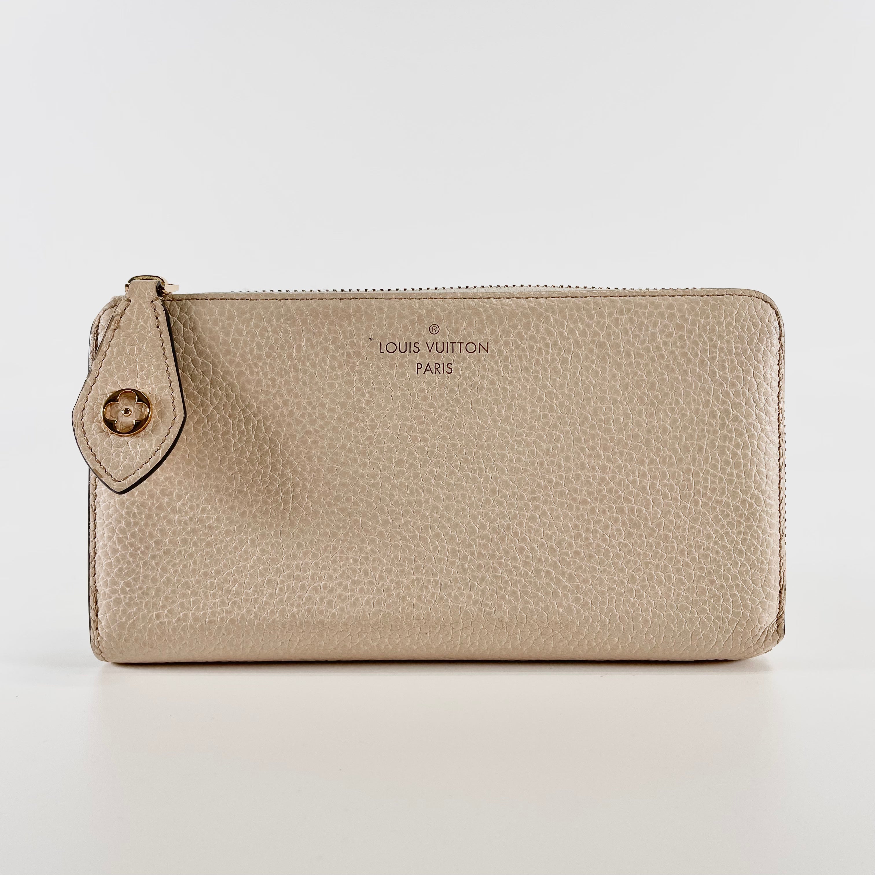 2603 secondhand LV M69504 leather Portefeuille comet cream MI5210