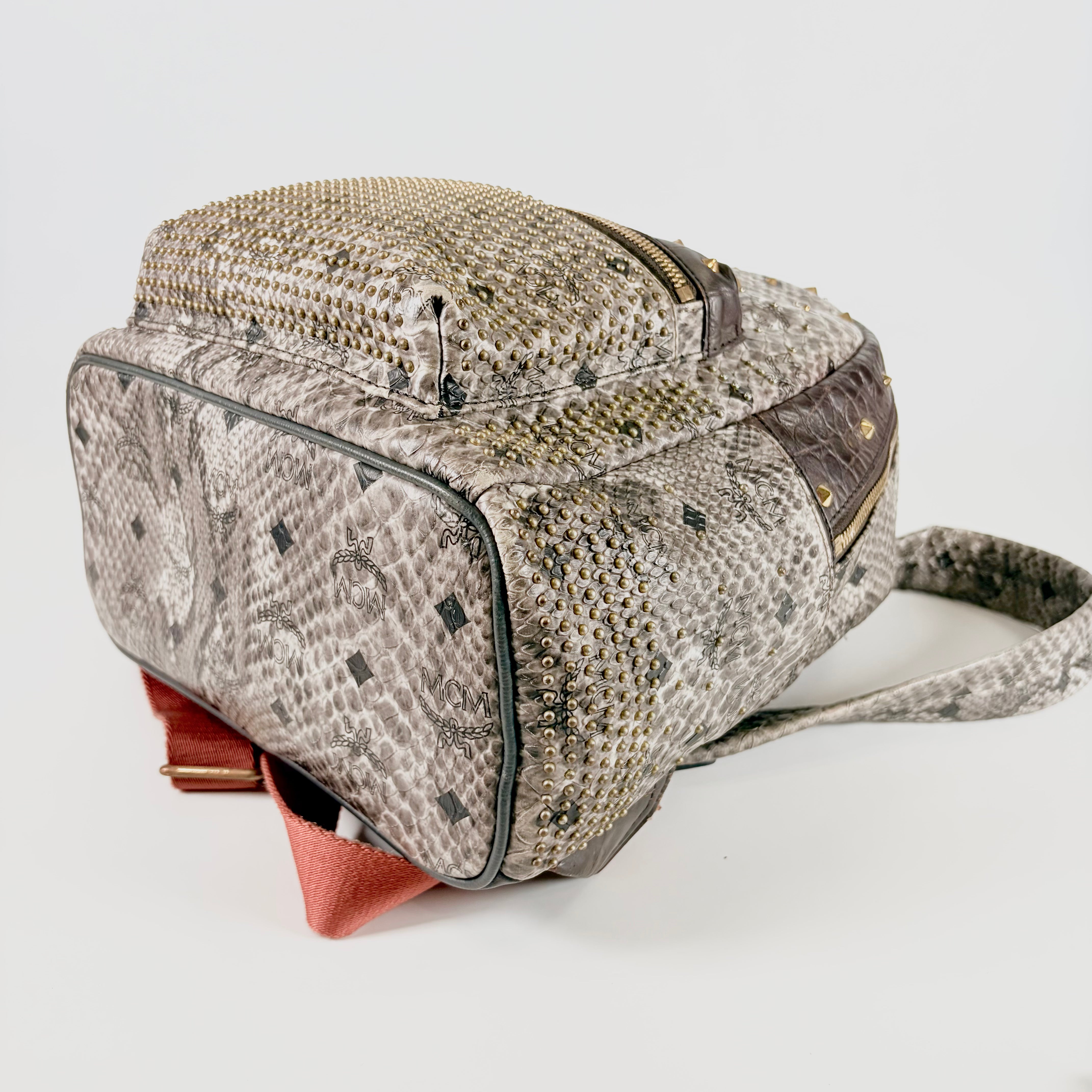 2605 secondhand MCM Embossed backpack