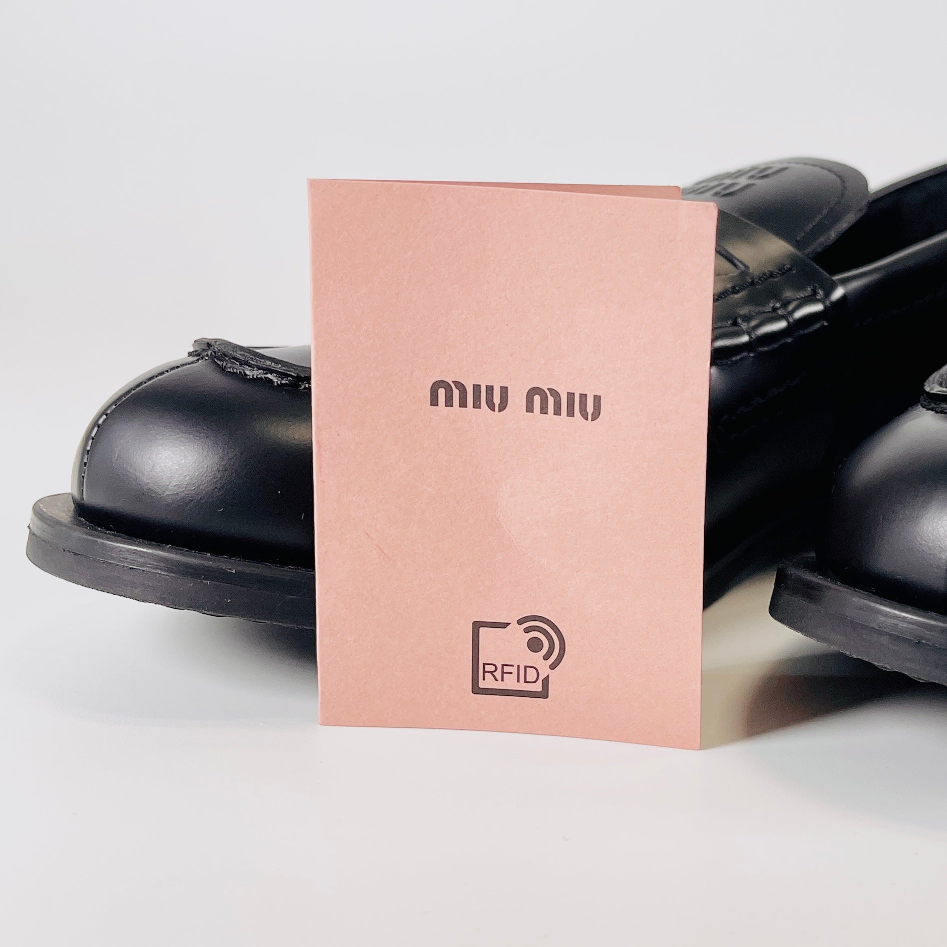 2606 secondhand MIUMIU leather Loafers 38 Women's black logo Embossing fur
