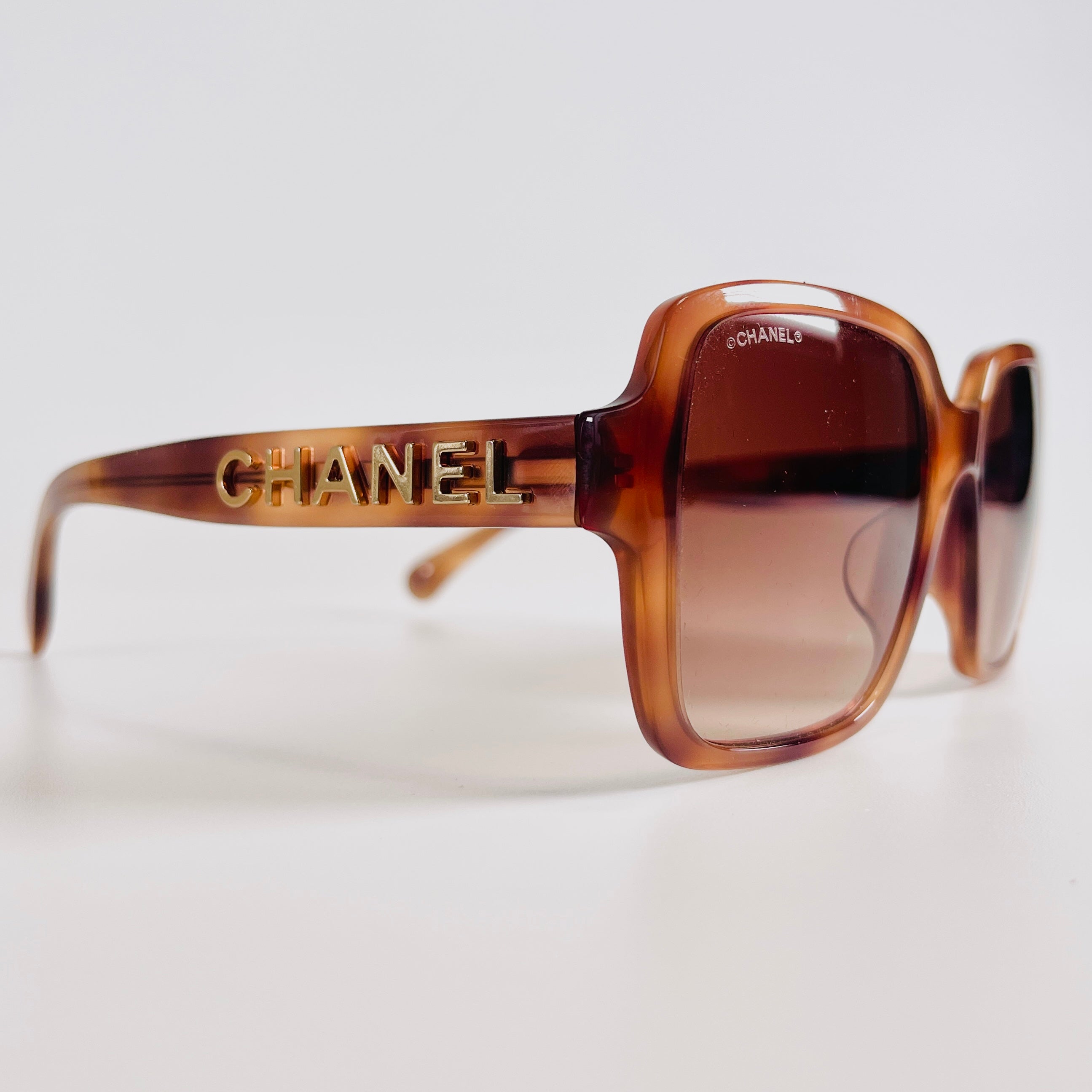 2604 secondhand CHANEL 5408 A logo sunglasses 56□17 plastic ×GP Brown × gold