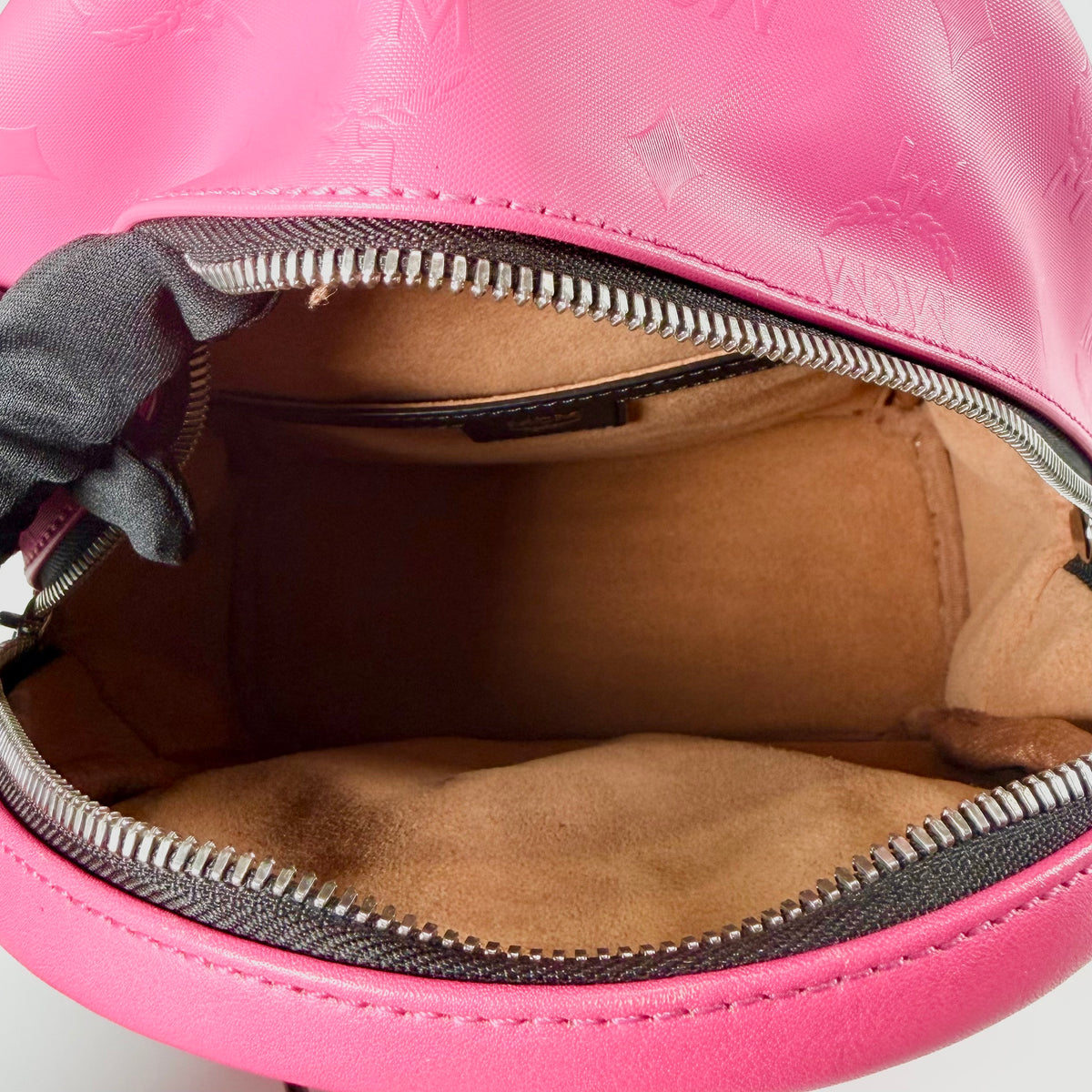 2607 secondhand MCM backpack studs Fuchsia pink leather