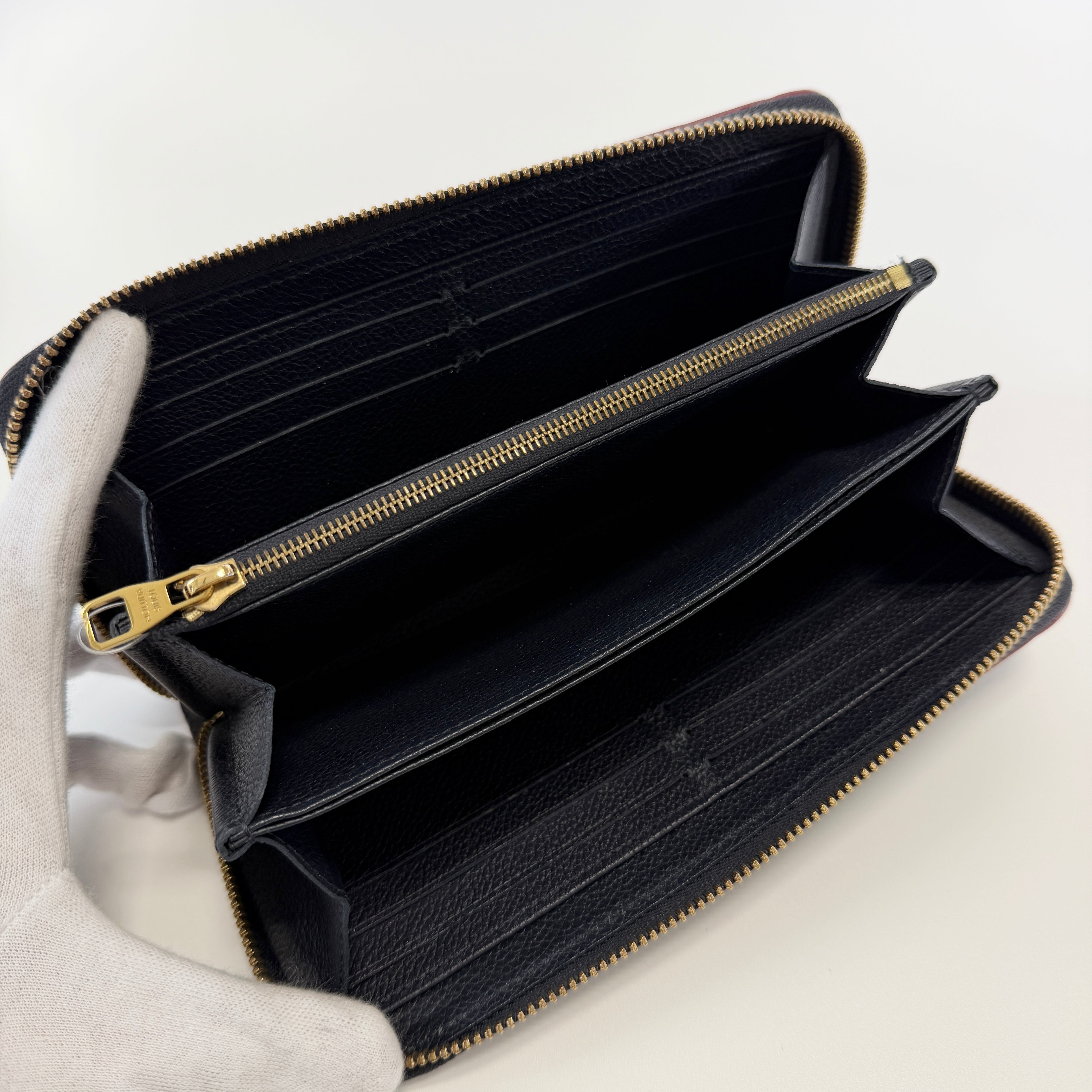 2606 secondhand LV Monogram Empreinte Zippy Wallet