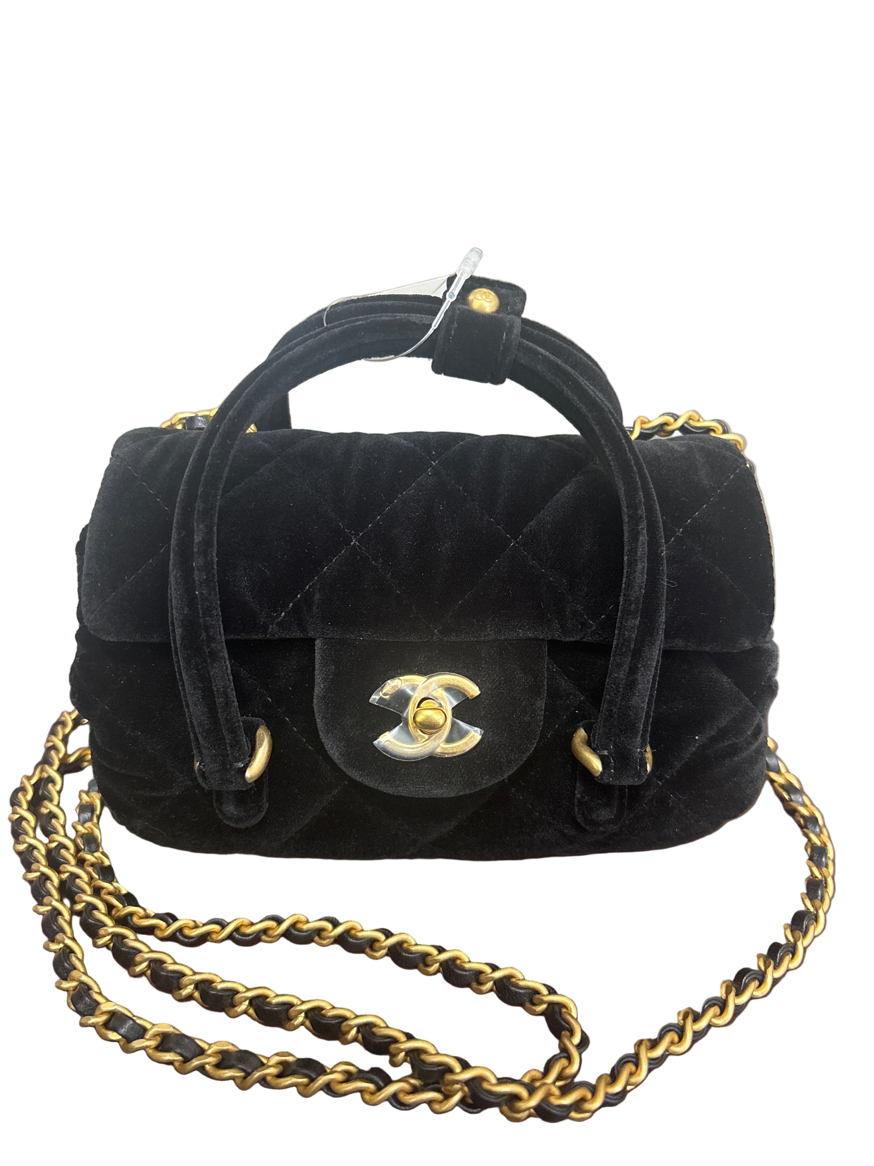 2509 CHANEL cylindrical handle bag
