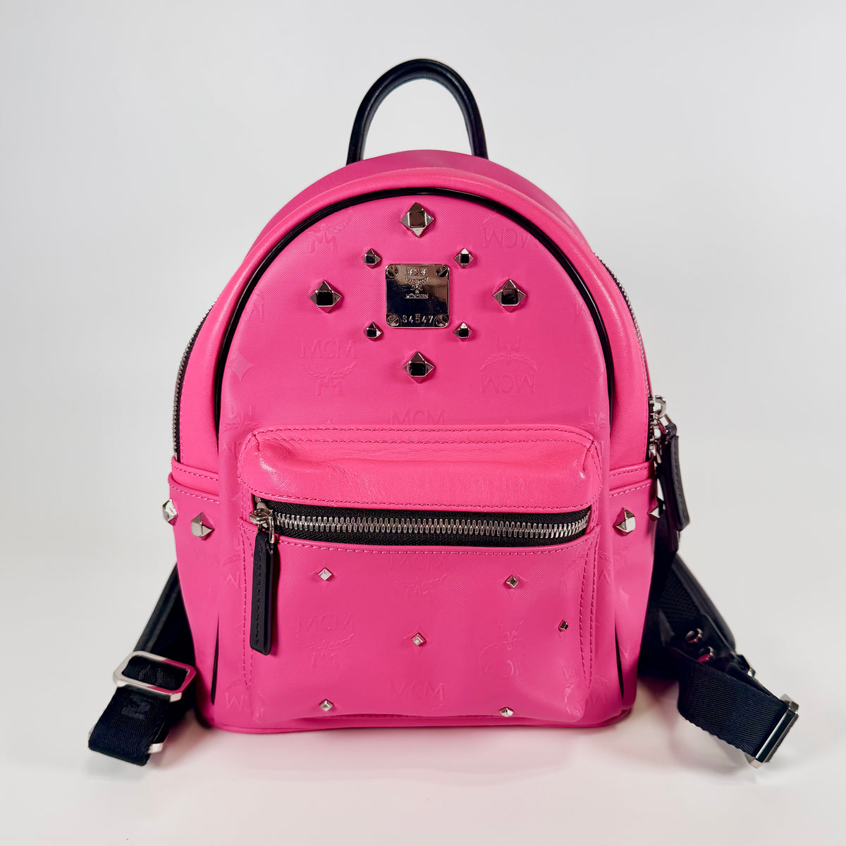 2607 secondhand MCM backpack studs Fuchsia pink leather