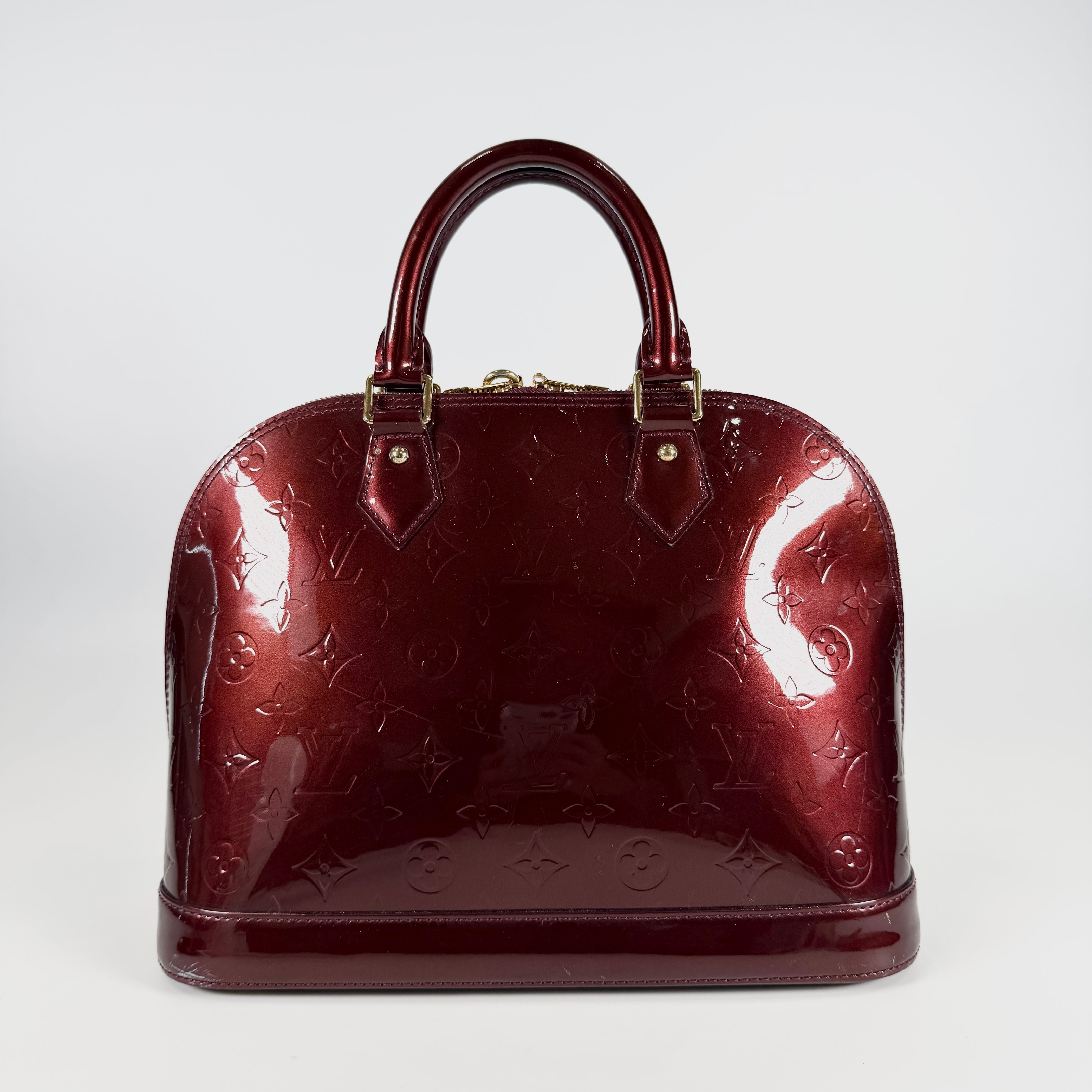 2607 secondhand LV Alma Vernis