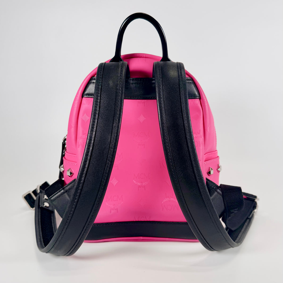 2607 secondhand MCM backpack studs Fuchsia pink leather