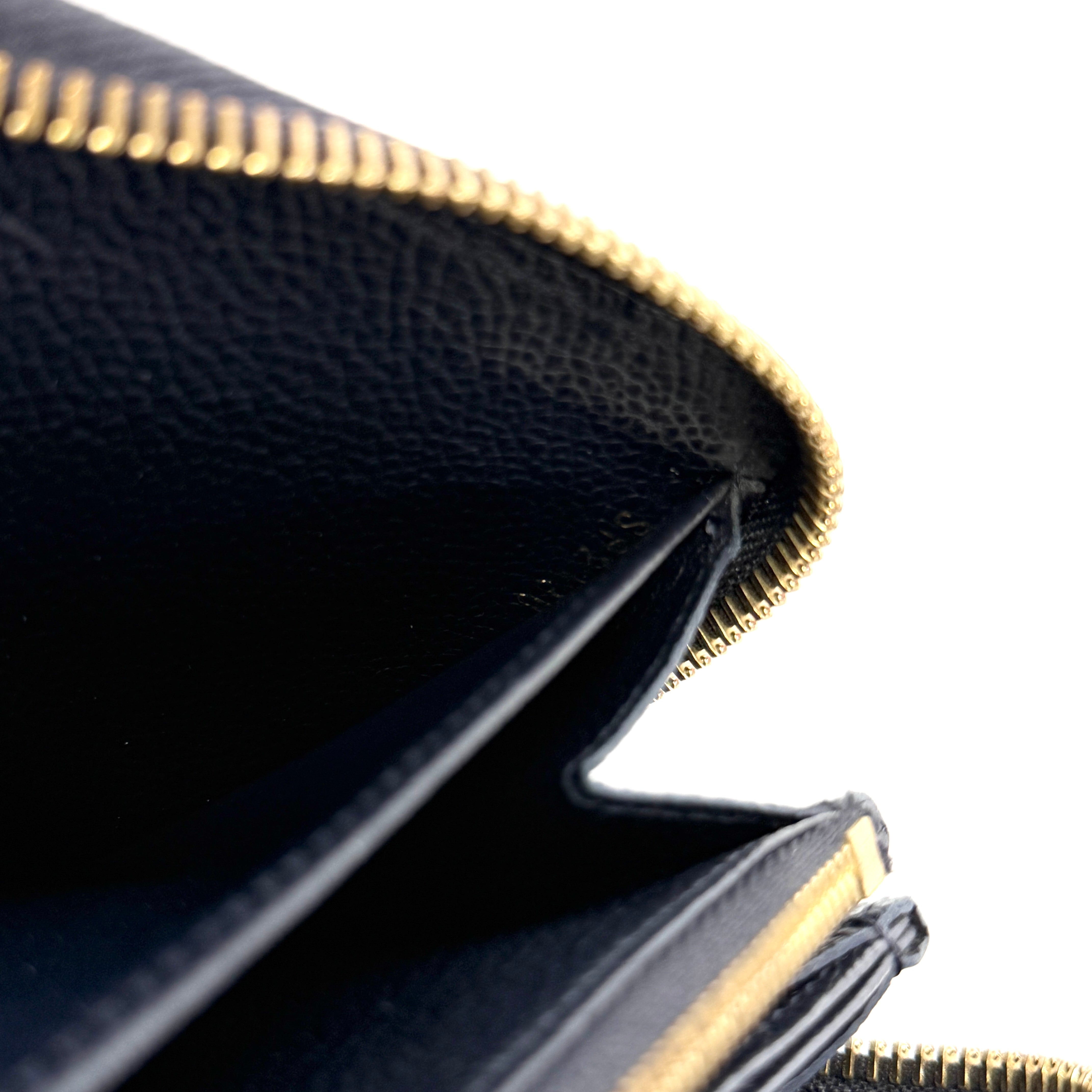 2606 secondhand LV Monogram Empreinte Zippy Wallet