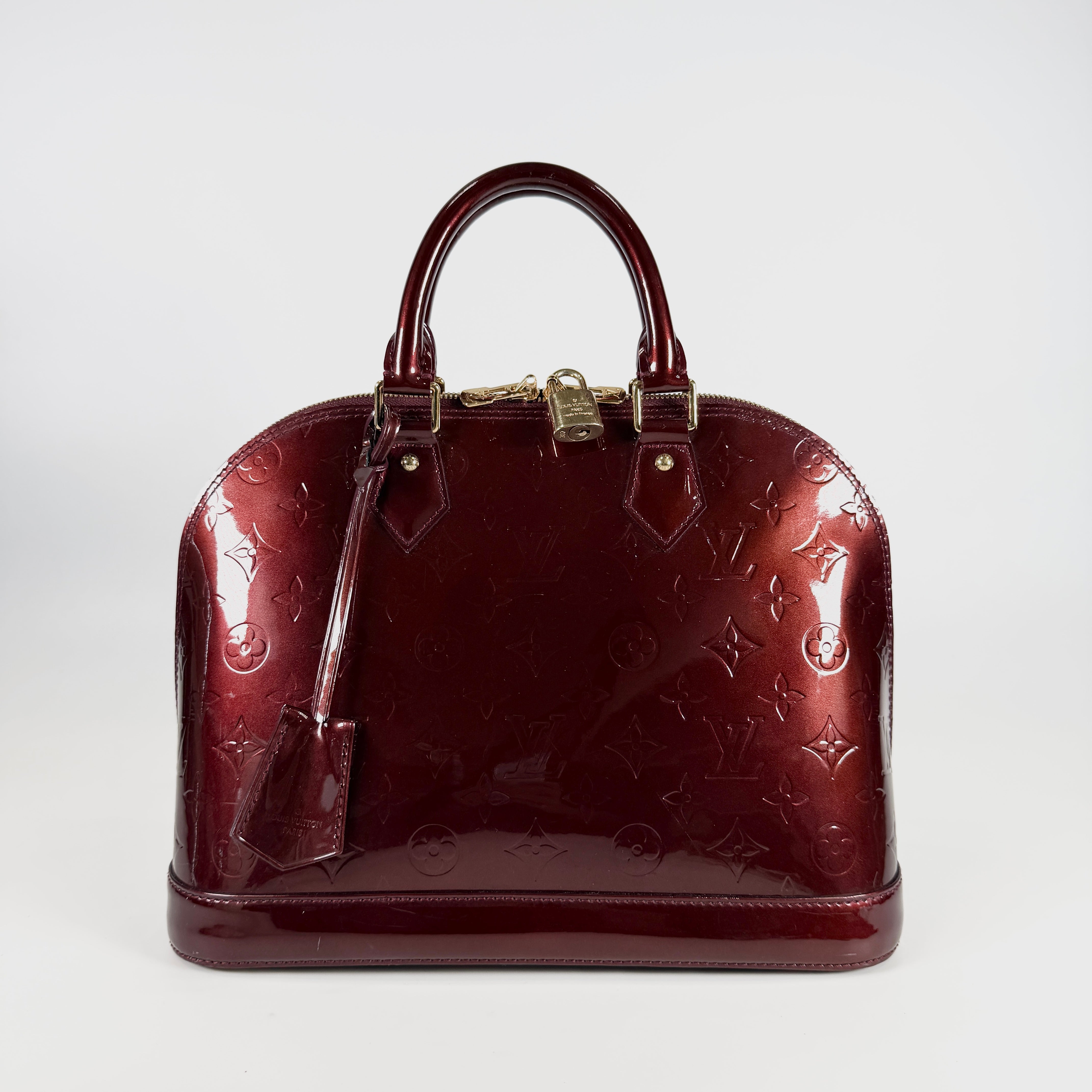 2607 secondhand LV Alma Vernis