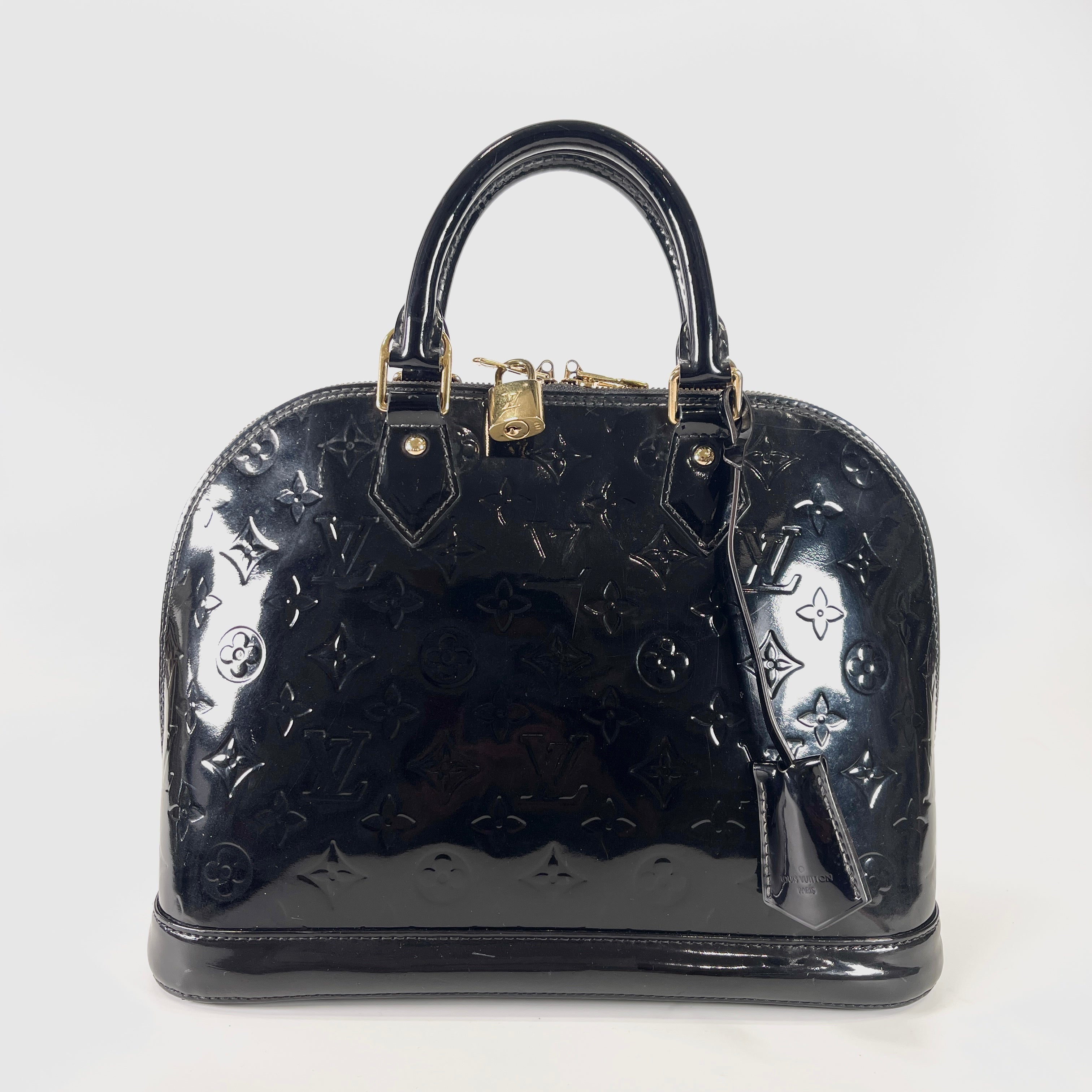 2605 secondhand LV hand bag Alma Monogram