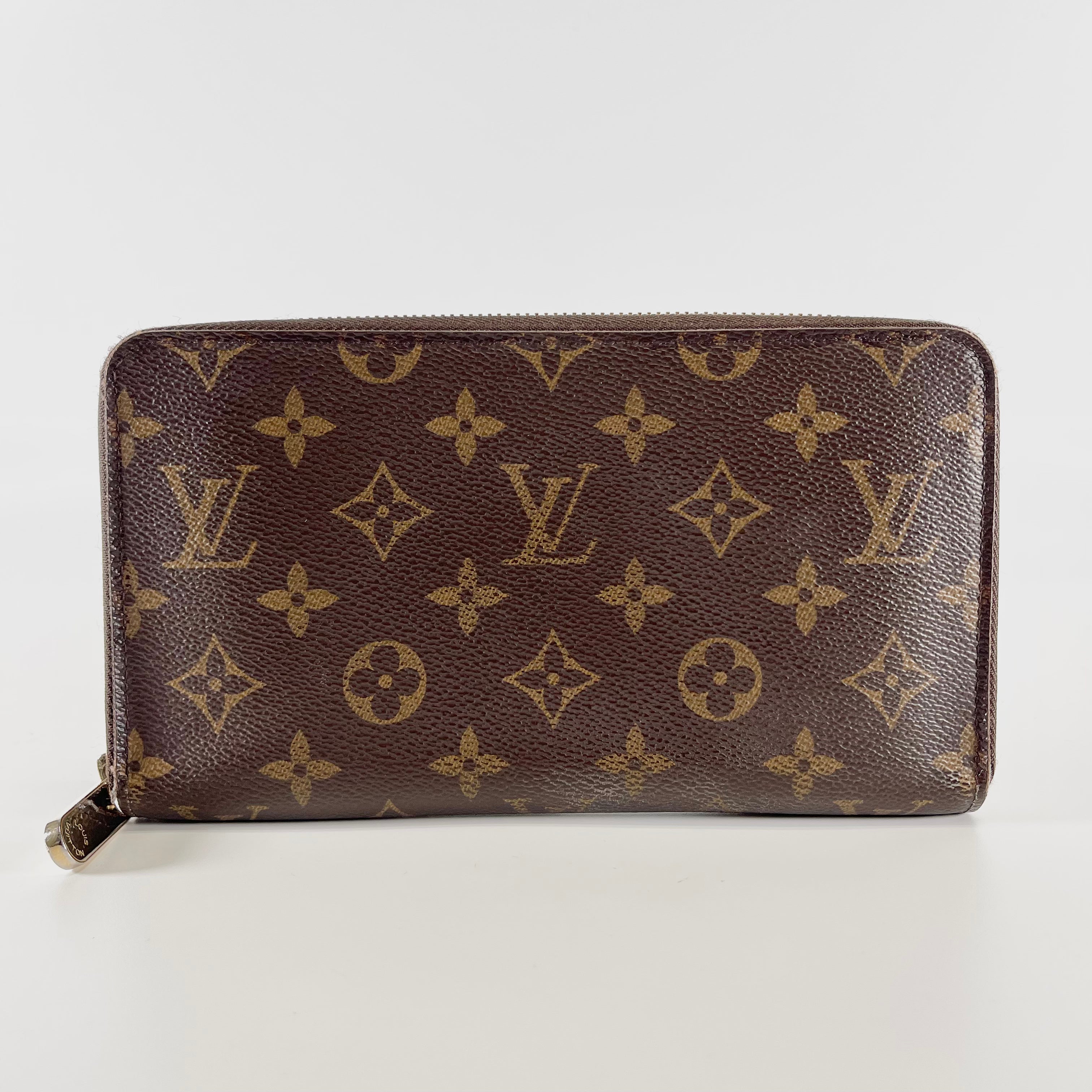 2603 secondhand LV Monogram M60002 PVC Zippy organizer CA0166