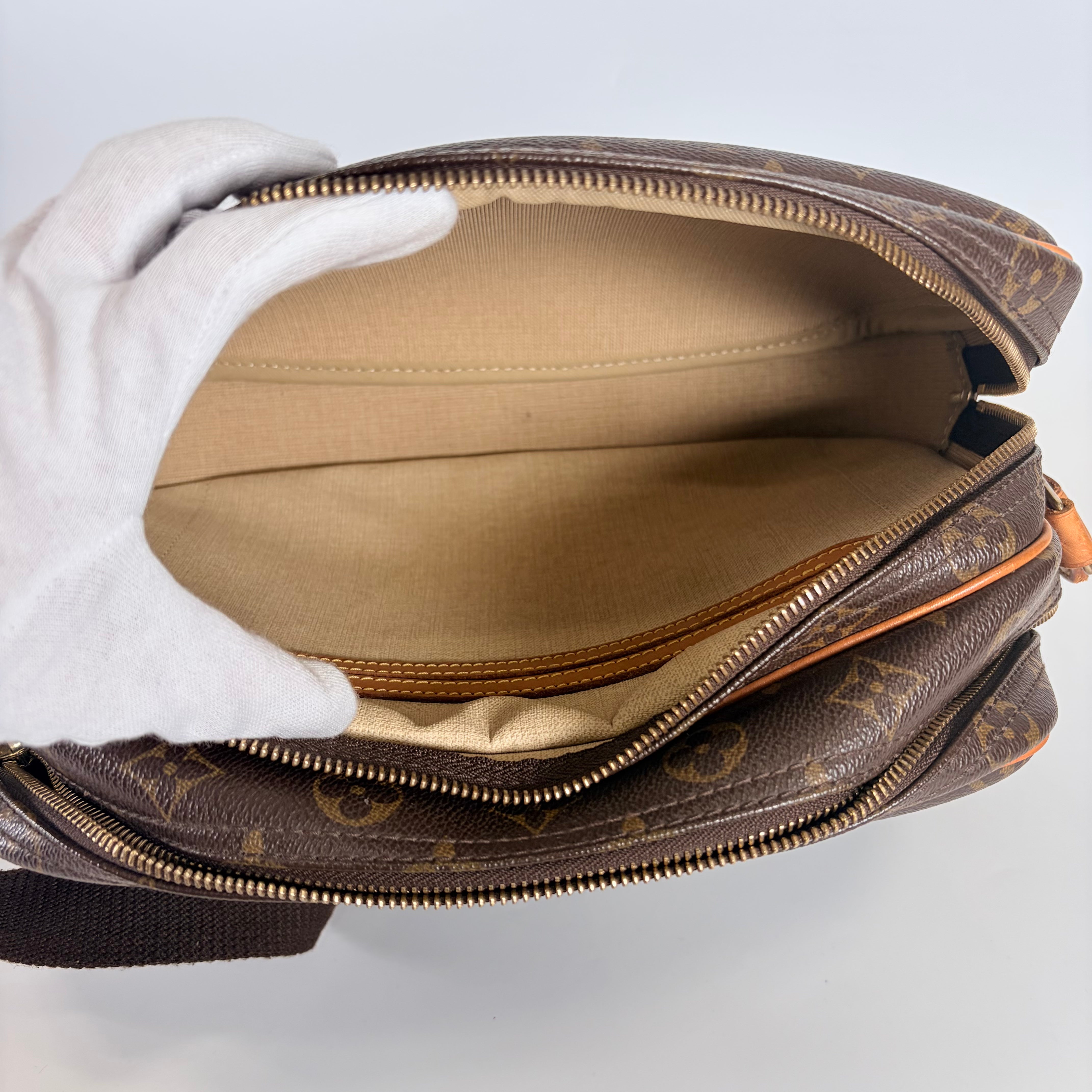 2604 secondhand LV Monogram reporter PM