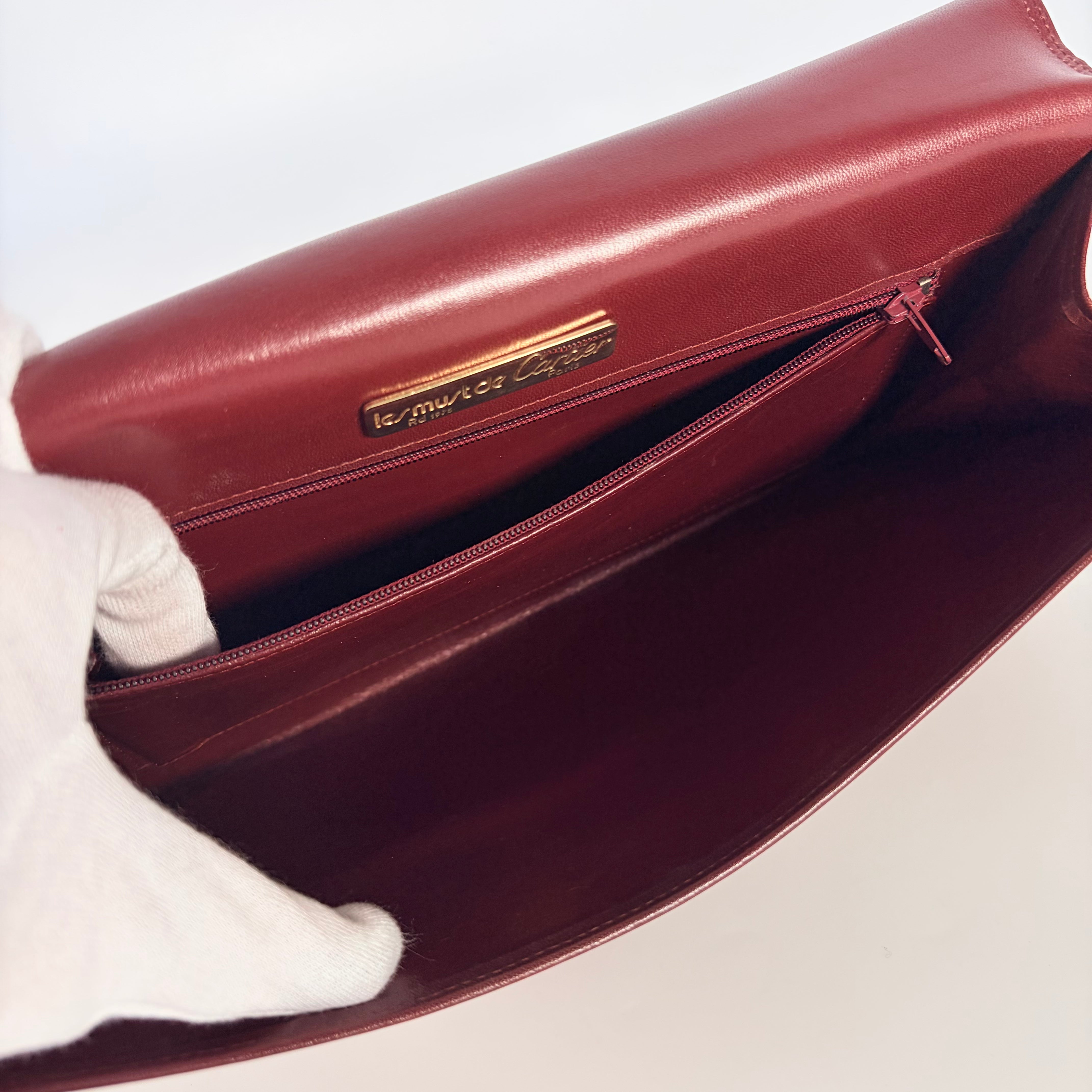 2605 secondhand CARTIER mustline Clutch Bag