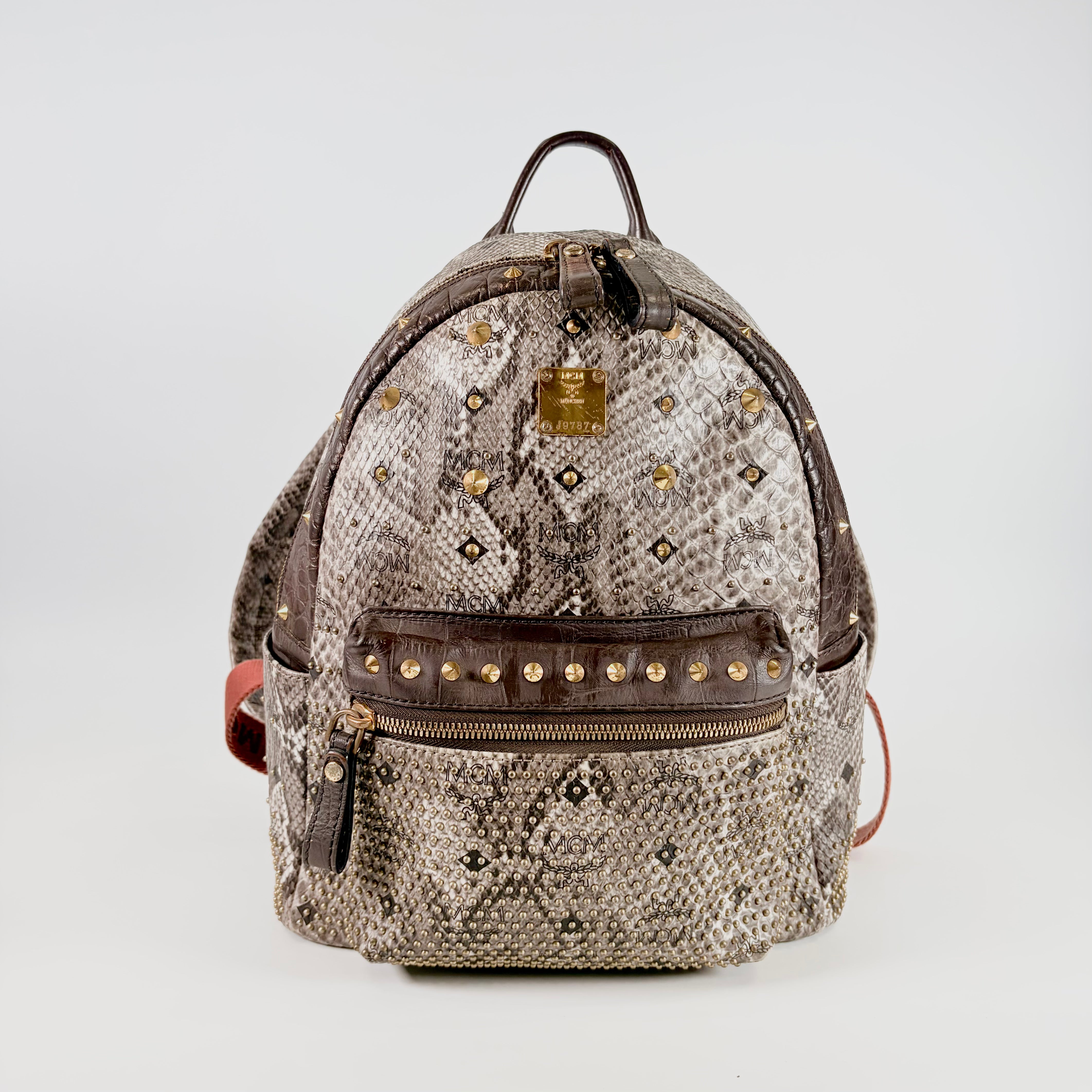 2605 secondhand MCM Embossed backpack