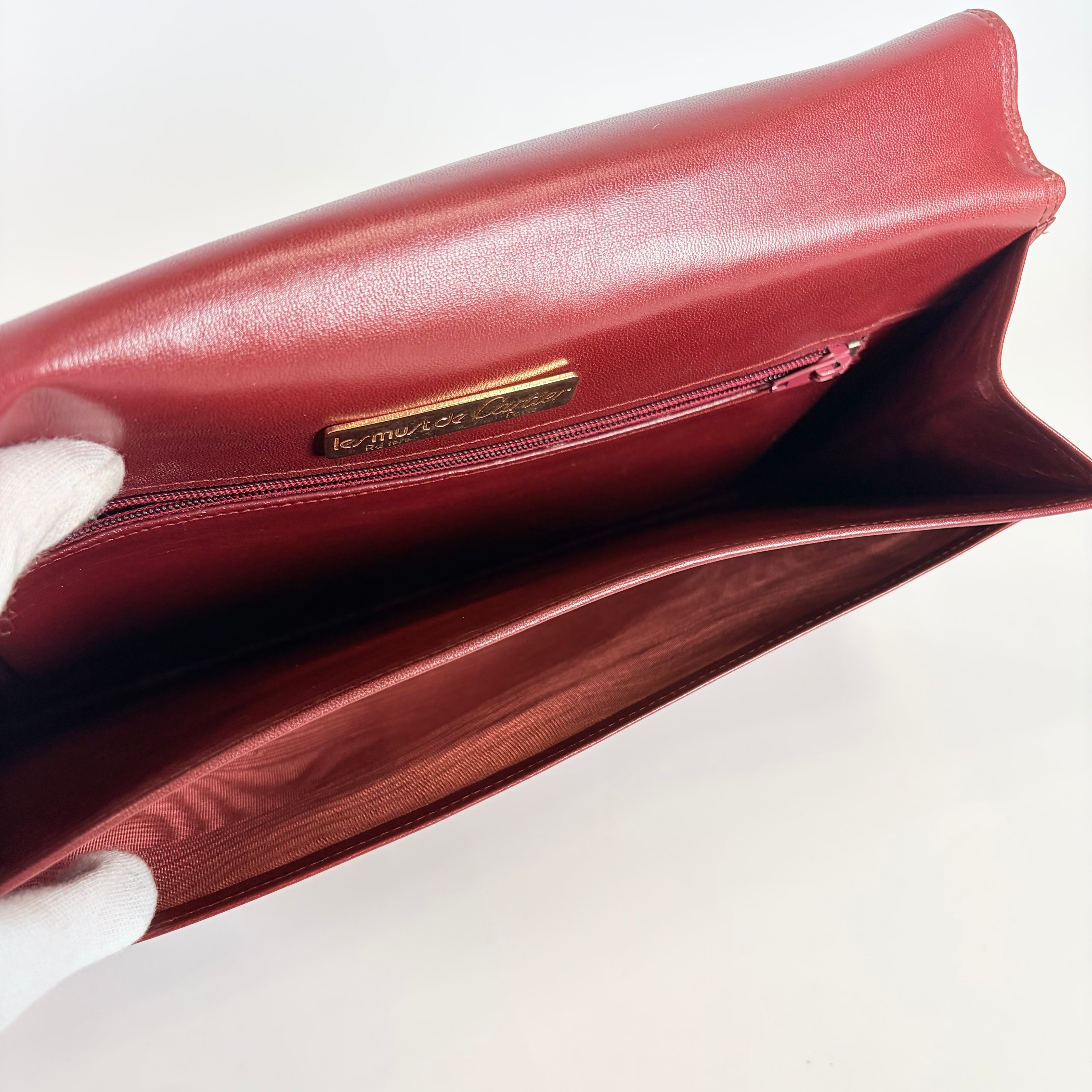 2605 secondhand CARTIER mustline Clutch Bag